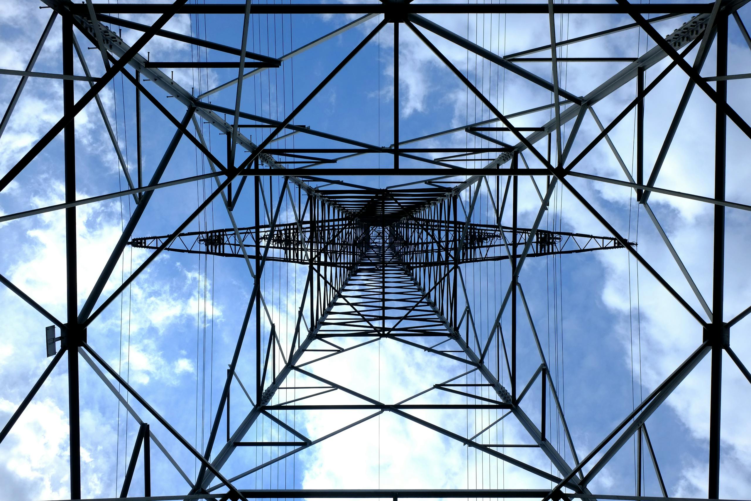 Low Angle Photograph of Black Metal Tower Satellite during Daytime